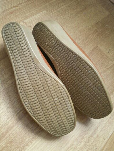 Beige coloured.