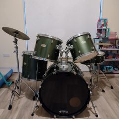 Pearl Drum Kit with professional drum heads.