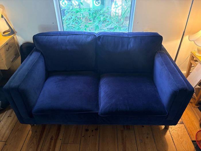 Two seater couch in navy velvet for sale