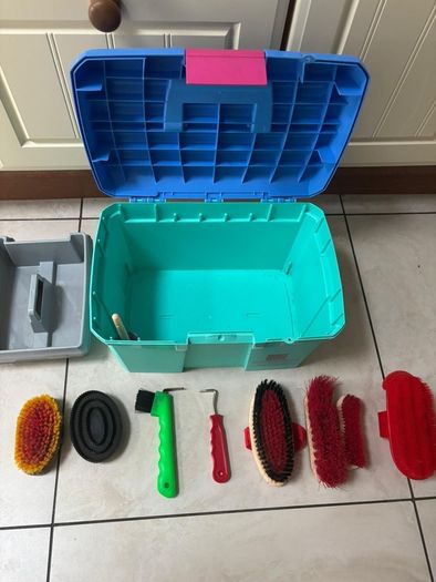 Equestrian tack box with 9 horse brushes
