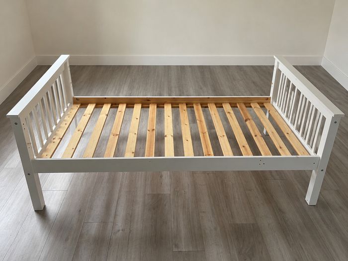 Wooden frame single bed plus mattress