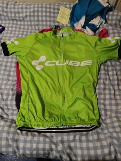 2 cycling shirts 1 is cube worth easily 50 euro and is brand new and pants with padding for on the saddle brand new never worn the second shirt is the official astana team training shirt also brand new  is the  would like to sell all together for a good p