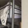 Loft bed with office desk beneath includes thick sprung mattress, very comfortable, frame can be fixed to the wall Image 4