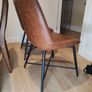 pair of faux leather dining chairs Image 2