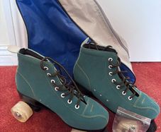 Teal suede roller skates