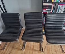 3 faux leather chairs