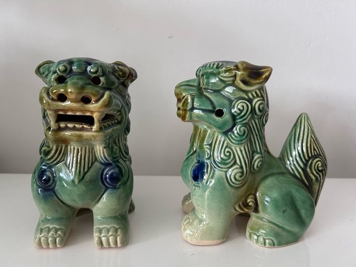 Two vintage Foo dogs in beautiful green glaze