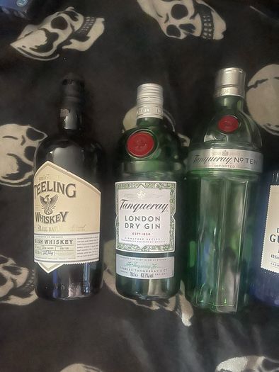 bombay sapphire gin teeling whiskey empty bottle