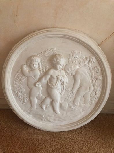 Plaster cast figures for wall