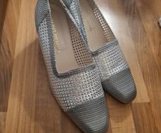 Silver low heeled pumps
