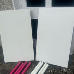 Two IKEA Advils table tops with legs