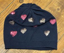 Cute navy hat with sequin hearts for a girl. 2-4 years