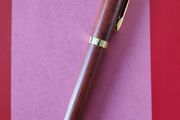 Handcrafted  Rosewood ballpoint pen with gold trim