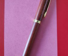 Handcrafted  Rosewood ballpoint pen with gold trim
