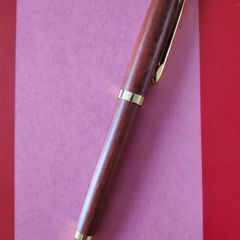 Handcrafted  Rosewood ballpoint pen with gold trim