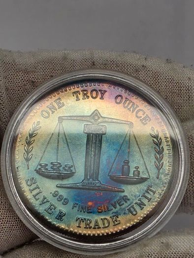 Silver Trade Unit One Troy Ounce .999 Fine Silver Coin Stunning Rainbow Toned Obverse and Reverse