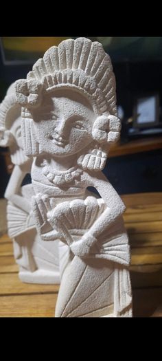 sandstone bookends/statues