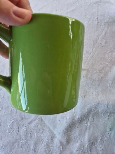 A novelty flick football interactive coffee mug