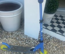 Blue two wheel scooter