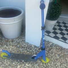 Blue two wheel scooter