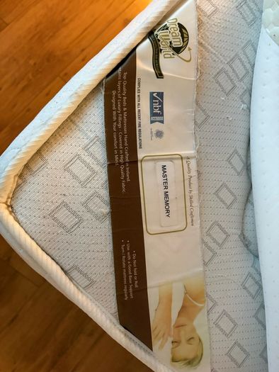 2 matching single beds with memory foam mattresses