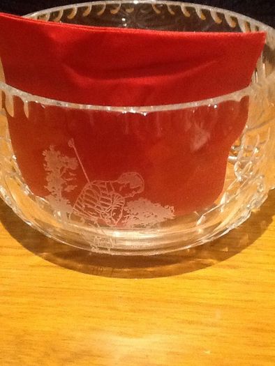 Crystal bowl with golfer engraved on side.