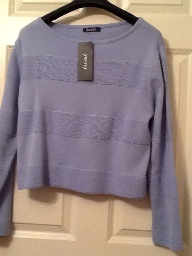 Light blue short jumper. 'Twist' brand