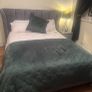 Reduced kingsize bed frame with matching curtains and leather armchair Image 8