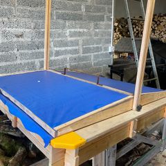 kids sandpit with roof