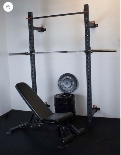 Wall mounted squat rack