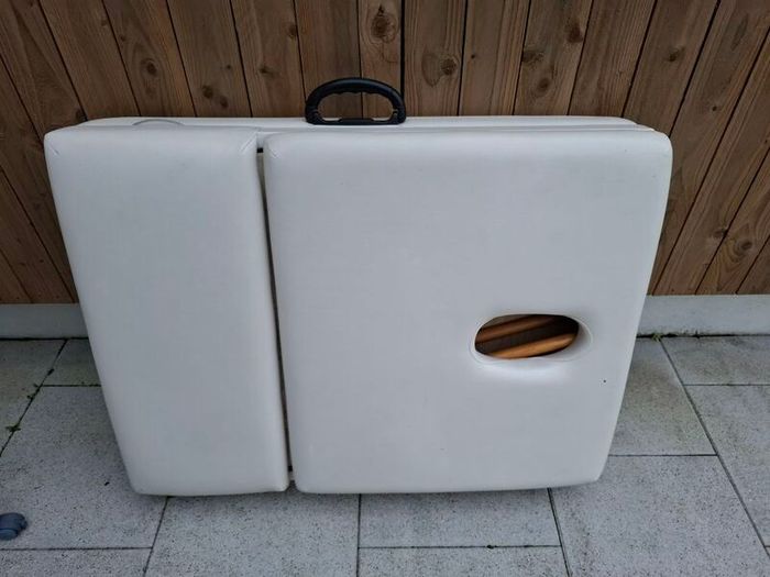 Massage table
