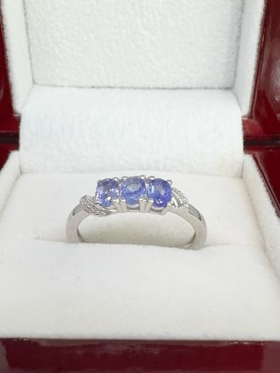 Silver Tanzanite Trilogy Ring in Platinum Overlay Sterling Silver.