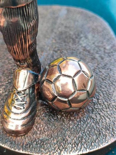 Two Gilded footballers