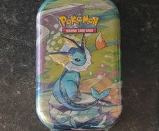 FREE Tracked Shipping. Pokemon Prismatic Evolutions Mini Tin