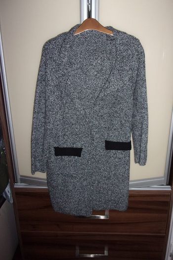 Cardigan sweater & coat .