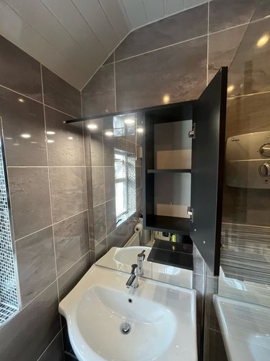 Bathroom Sink and Cabinet