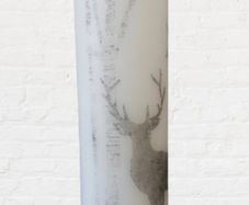 Winter christmas decorative white candle with grey deer reindeer Xmas table home decor Xmas eve gift advent scandinavian style tree wood star