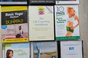 Collection of health, fitness and self-help CDs and DVDs