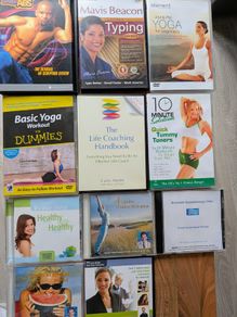 Collection of health, fitness and self-help CDs and DVDs