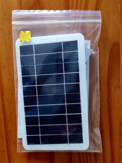Solar Charger with USB conection. New, unopened.
