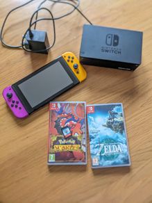 nintendo switch + games (READ DISCRIPTION)