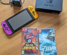 nintendo switch + games (READ DISCRIPTION)