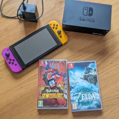 nintendo switch + games (READ DISCRIPTION)