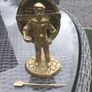 Heavy solid brass sailor with boat on back, 1979, D18 post 10e Image 4
