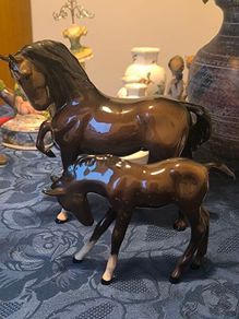 Capturing the elegance of the Arabian, this vintage figurine set includes a prancing Arabian horse