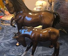 Capturing the elegance of the Arabian, this vintage figurine set includes a prancing Arabian horse