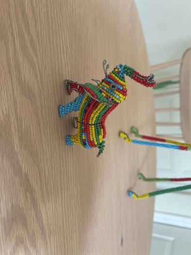 Hand beaded giraffe and elephant