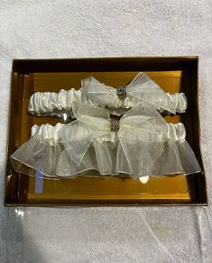 Boxed Pair of wedding garters with diamonte