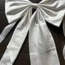Bow for wedding, cream white, perfect for cake table, has ribbon at back to tie/hang up Image 2