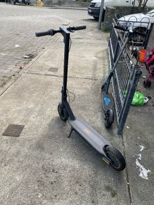 2 scooters one ninebot one motus